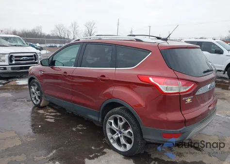 2014 Ford Escape Titanium z USA, uszkodzony, nr VIN 1FMCU9J97EUB42442